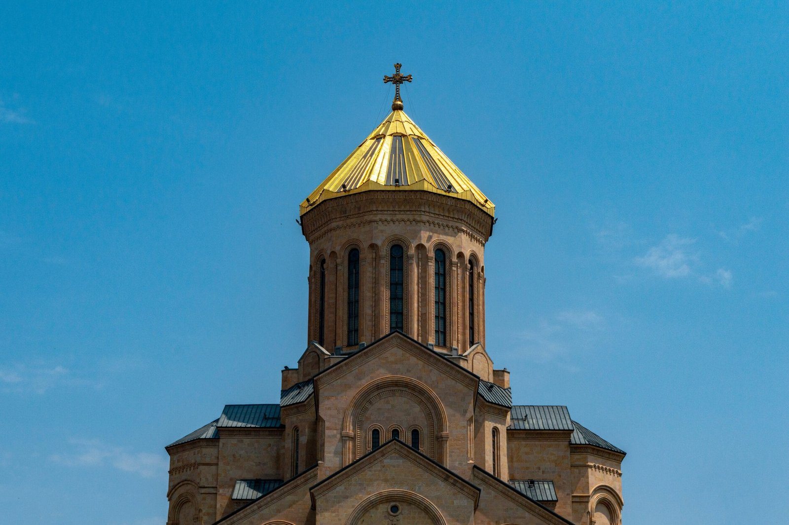 a church steeple with a cross on top